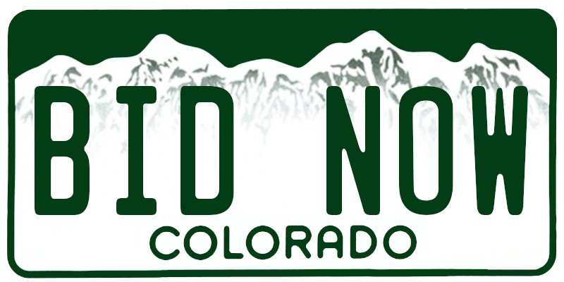 Colorado license plate with the text BID NOW